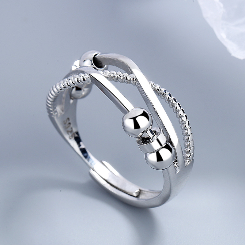 Carlyle moda inteligente de Europa y América personalidad simple de doble capa Cruz bobina nicho anillo giratorio joyería femenina al por mayor