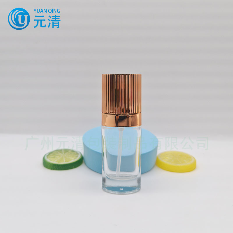 现货30ml 透明玻璃按压精油瓶  金色竖纹盖感瓶椭圆形精华瓶包材
