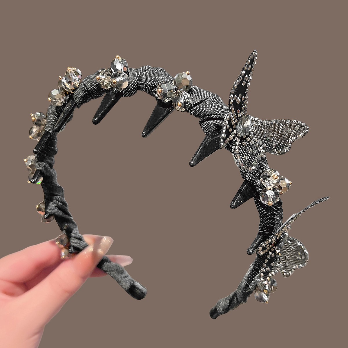 Gray denim-wrapped crystal butterfly