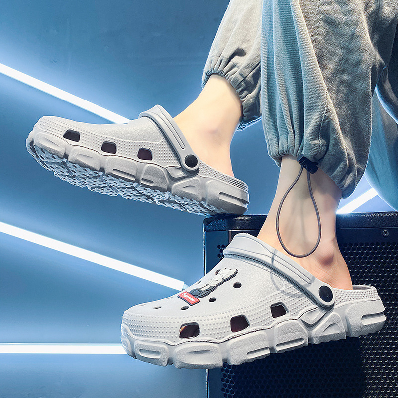 Zapatos con agujeros, zapatos casuales de verano nuevos para hombres, transpirables, huecos, ligeros, pisando mierda, dos zapatillas de Baotou vadeando en la playa