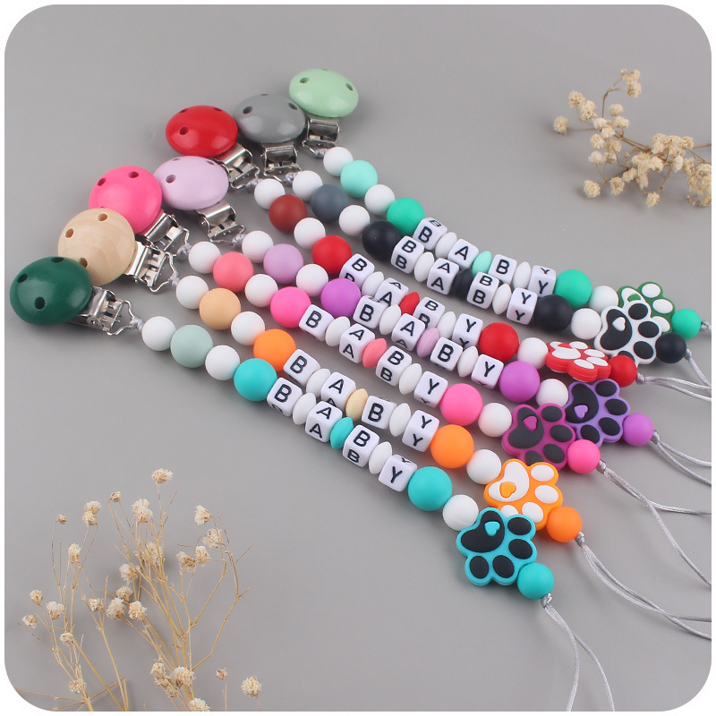 Nuevo bebé suministros de dibujos animados perro garra silicona mordedor creativo bebé DIY mordedura molar pezón cadena anti-caída