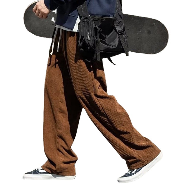 Pantalones casuales primavera y otoño para hombres nuevos pantalones rectos drapeados de moda de color sólido para hombres y mujeres pantalones anchos sueltos de moda de Hong Kong