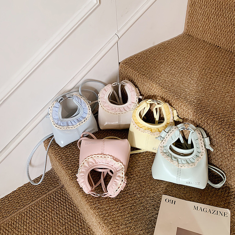 Bolsos infantiles transfronterizos dulces pequeños bolsos de encaje frescos exquisitos mini bolsos de hombro para niños y niñas