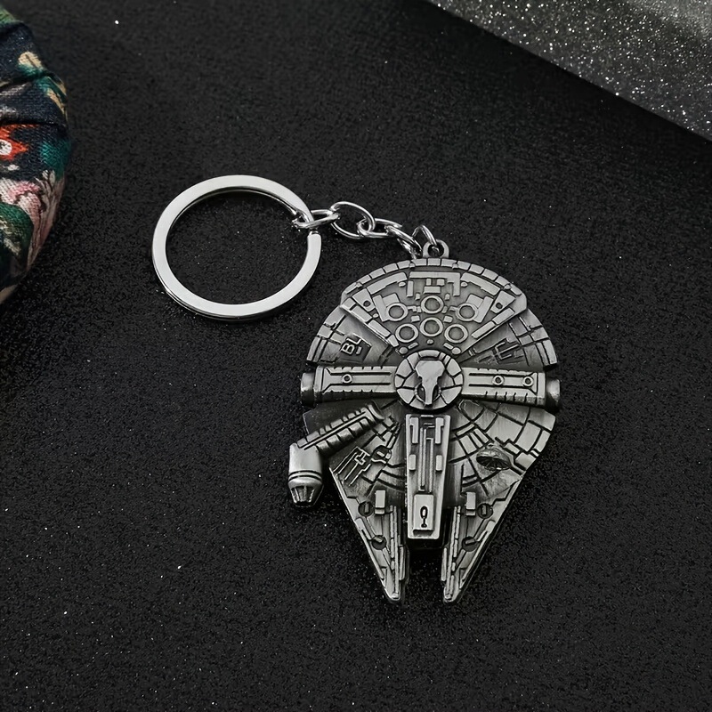 Star Wars Millennium Falcon Spacecraft Keychain Retro Vintage Metal Alloy Pendant Film and Television Merchandise Wholesale Star Wars Millennium Falcon Spacecraft Keychain Retro Vintage Metal Alloy Pendant Film and Television Merchandise Wholesale
