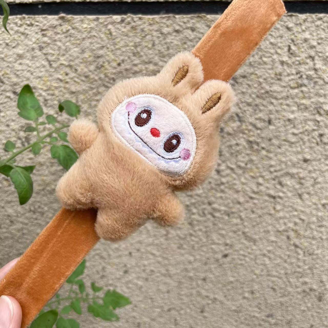 Muñeca creativa Panda raqueta anillo pulsera niños muñeca de peluche juguete bicicleta accesorios boda regalo de mano