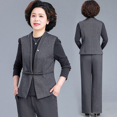 母の日の若いお母さんの春の服のスーツのファッションのベストのコートの中で年配の女性の春秋の気質の上着の広い足のズボン
