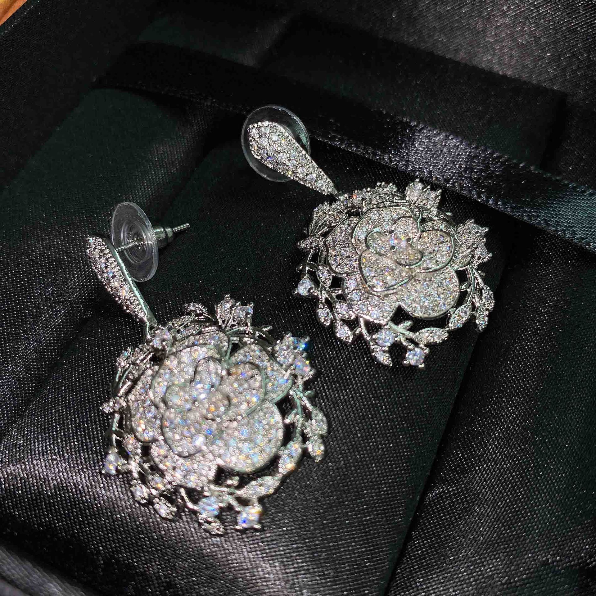 Elegant Socialite Hollow-out Exquisite Rose Necklace Camellia Stud Earrings Flower-shaped Flower Cluster Ring Opening Accessories Set display picture 1