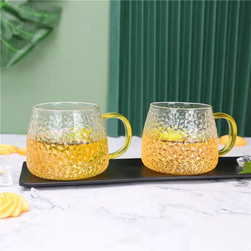 Wholesale High Borosilicate Glass Hammered Pattern Empress Cup with Handle for Tea, Juice, Milk, Morning Glass Tea Cup