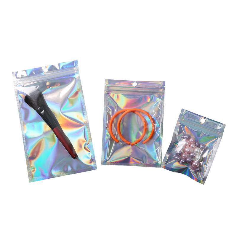 Laser packaging bag self-sealing bag yum yin and yang bag plastic bag holographic aluminum foil plastic bag rainbow magic color jewelry bag Laser packaging bag self-sealing bag yum yin and yang bag plastic bag holographic aluminum foil plastic bag rainbow magic color jewelry bag