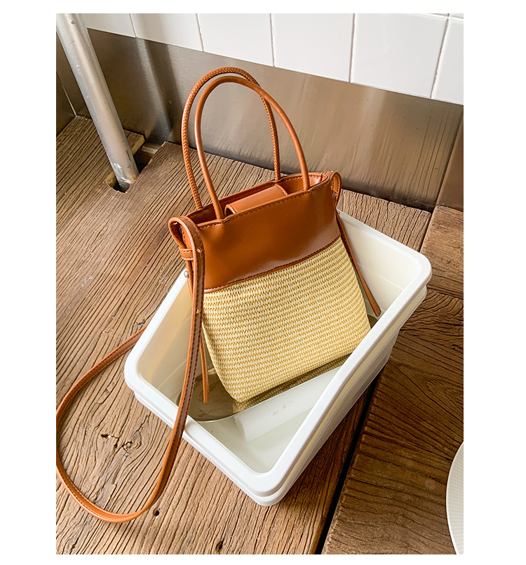 Korean style simple and fashionable woven mobile phone bag for women 2025 summer new seaside vacation crossbody straw woven bucket bag undefined