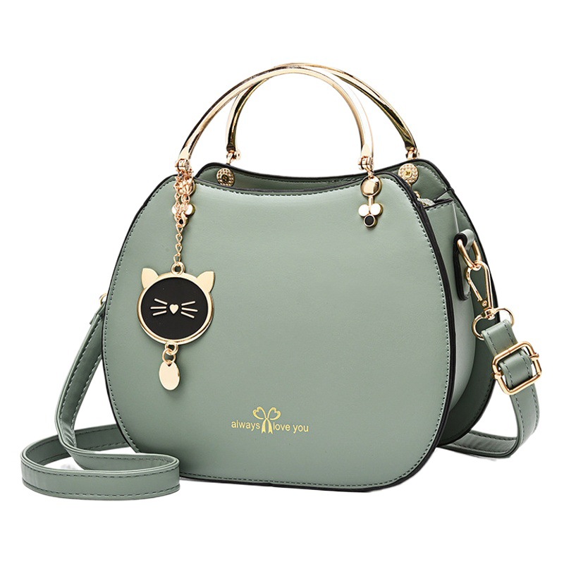 Bolso de las mujeres 2024 estilo coreano moda chica estilo Shell bolsa estilo occidental gato mensajero bolso de hombro de las mujeres