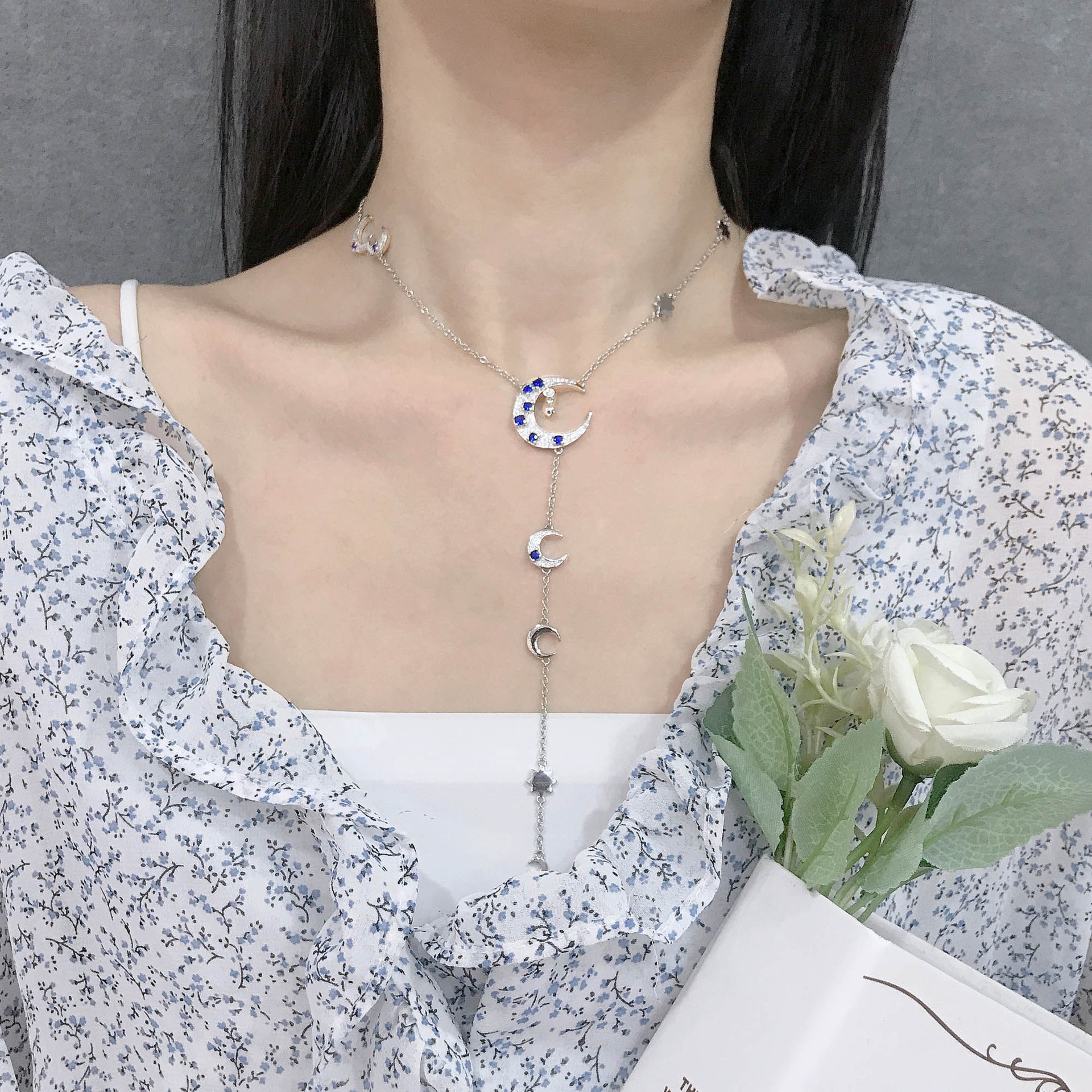 Niche Ins Style Micro Inlaid Zircon Star Moon Y-shaped Mid-length Clavicle Chain Dark Blue Sun Moon Star Necklace display picture 1