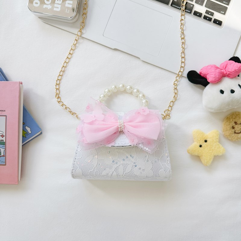 Bonito pequeño viento de la princesa viento bolso de perlas bolso de mano bolso de hombro para niños arco