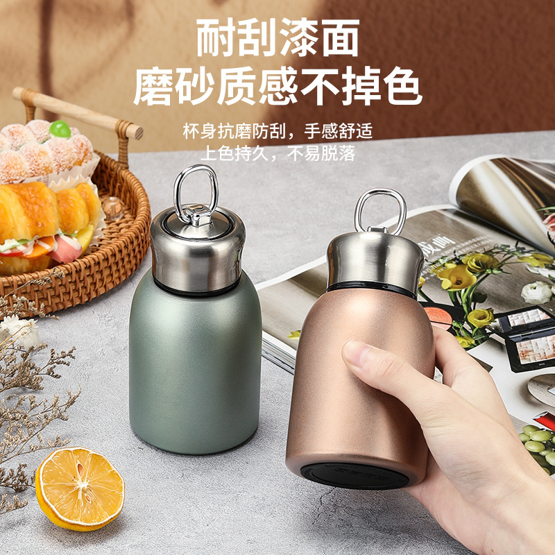 Taza termo de moda nacional de estilo caliente, taza termo de mano portátil al aire libre de moda para el hogar, taza de agua para estudiantes, taza termo para automóvil