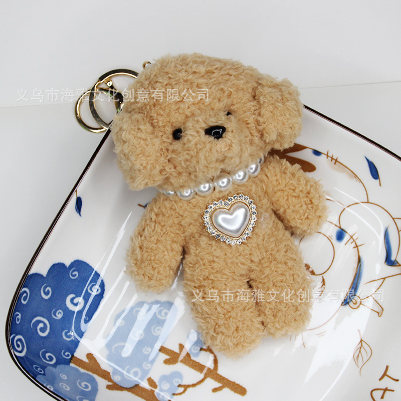 Japonés y coreano lindo dibujos animados VIP perro perla amor aleación colgante teléfono móvil bolsa llavero colgante coche colgante