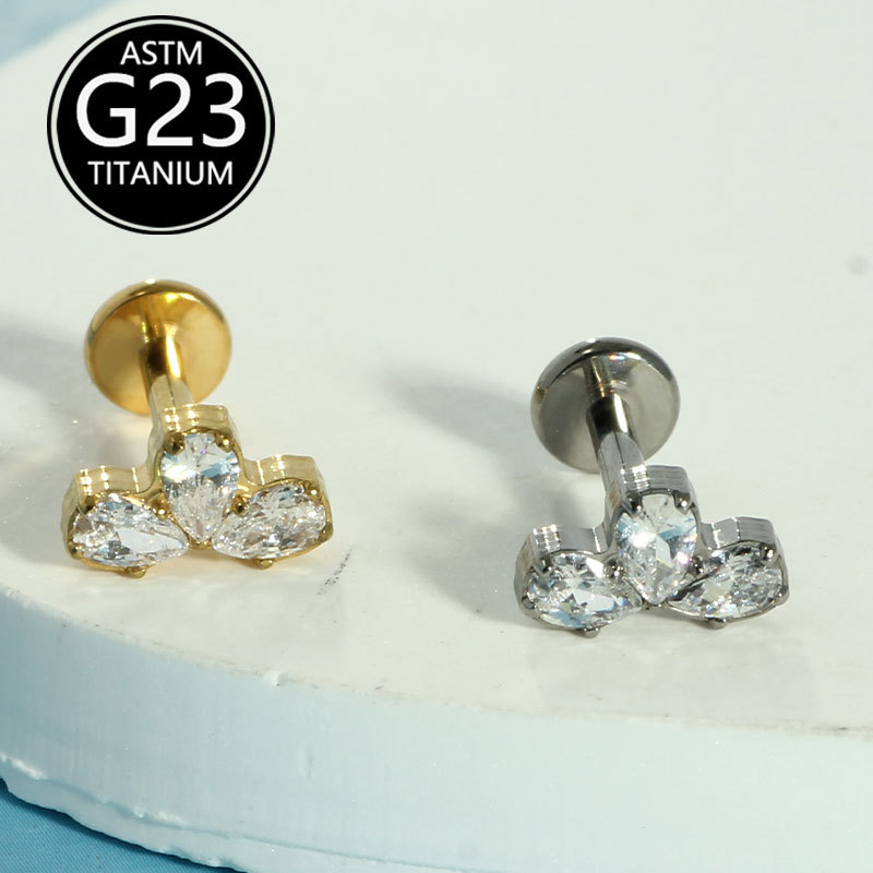 Silver pointed spike labret stud material detail