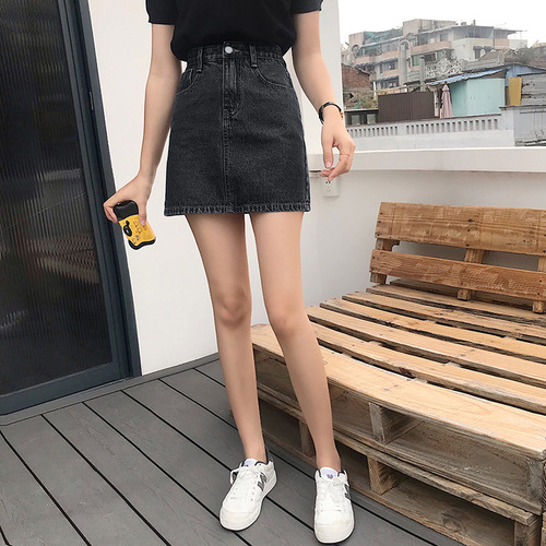 A petite-chic A-line denim skirt for summer, featuring a South Korean style, loose fit, high waist, and Instagram-inspired design for a trendy look.