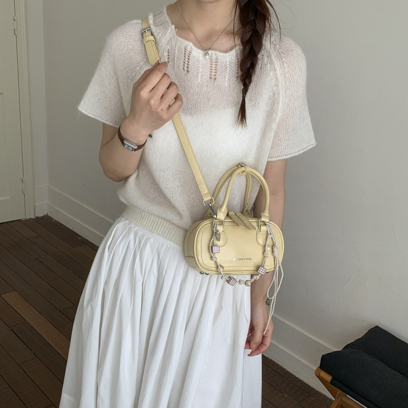 Bolsa de hombro coreana de diseño de nicho simple 2026 nueva moda femenina de tendencia diaria textura de viaje popular bolso de hombro