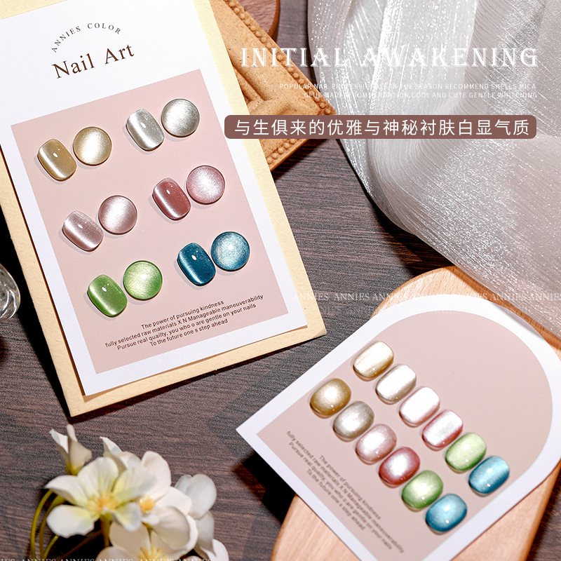 Enni shichu xingguang gato ojo esmalte de uñas pegamento 2024 Otoño e Invierno popular espejo cuentas de vidrio pequeño bulbo