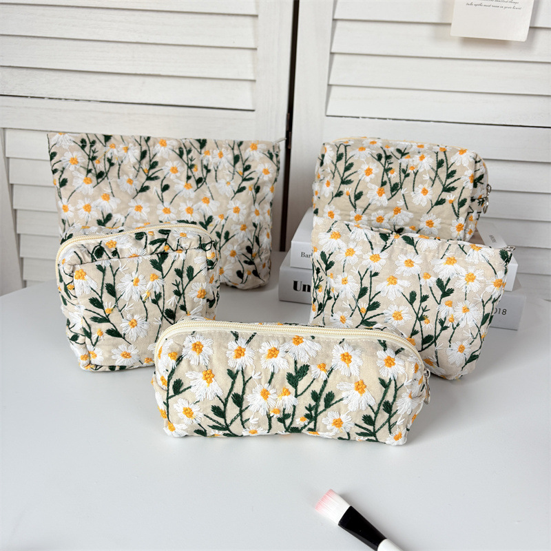 Nueva bolsa de cosméticos de mano con flores bordadas de algodón, bolsa de lápices simple y de gran capacidad para estudiantes, bolsa de almacenamiento de lavado de alto valor