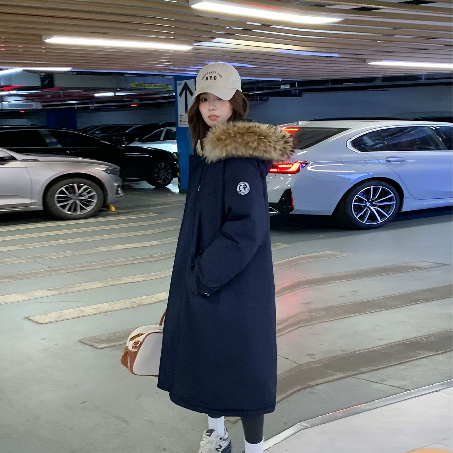 Long over-the-knee large fur collar assault cotton coat for women 2025 winter new Korean style loose thickened down cotton coat trendy workwear