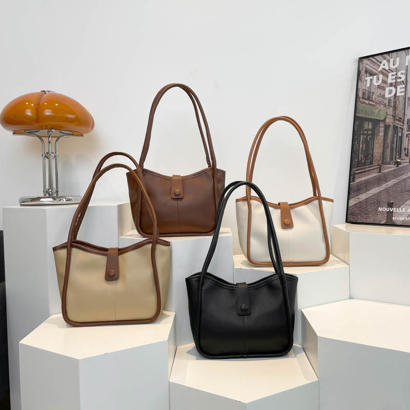 Bolsa de balde popular 2025 primavera nuevo estilo coreano retro de gran capacidad clase de viaje bolsa de hombro bolsa de moda