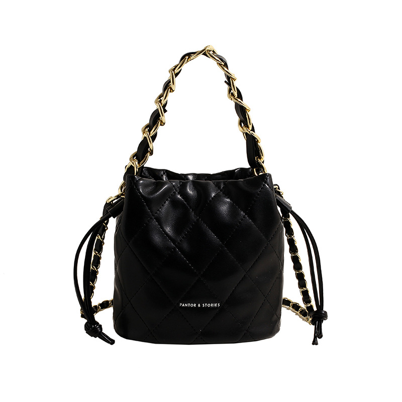 Bolso de las mujeres 2024 primavera nueva cadena de diamantes bolso de cubo portátil estilo Chanel textura de alto grado bolsa de mensajero del hombro