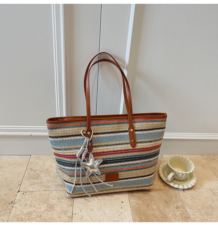 Summer striped woven large-capacity tote bag 2025 New style fashionable and trendy Korean style simple and elegant casual single-shoulder bag undefined