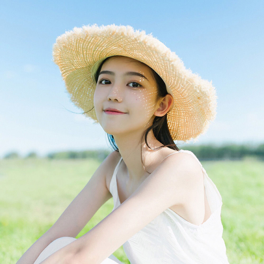 Cappello da sole in paglia per donna con fiocco e tesa larga_voghion.com