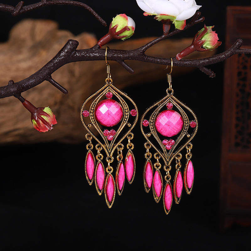 Creative Exaggerated Hollow Water Drop Tassel Ethnic Style Diamond Earrings display picture 1