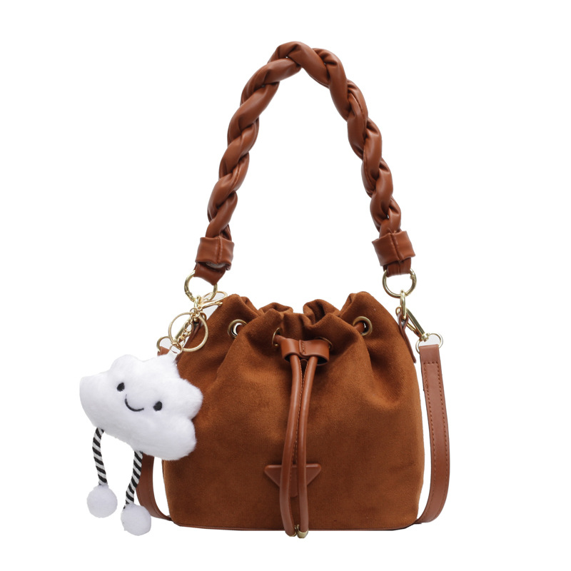 Moda esmerilado diseño de la abertura de la bolsa de cubo de mano mujer otoño y invierno 2025 nuevo estilo popular bolso de hombro universal