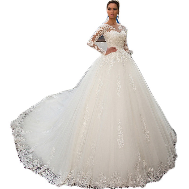 Vestido de novia de comercio exterior 2026 con cuello redondo, manga larga, encaje, estilo francés adelgazante y cola de sirena.