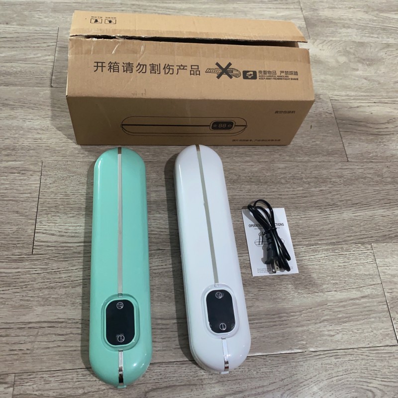 复制_小型迷你真空机包装机 家用厨房便携式食品.jpg