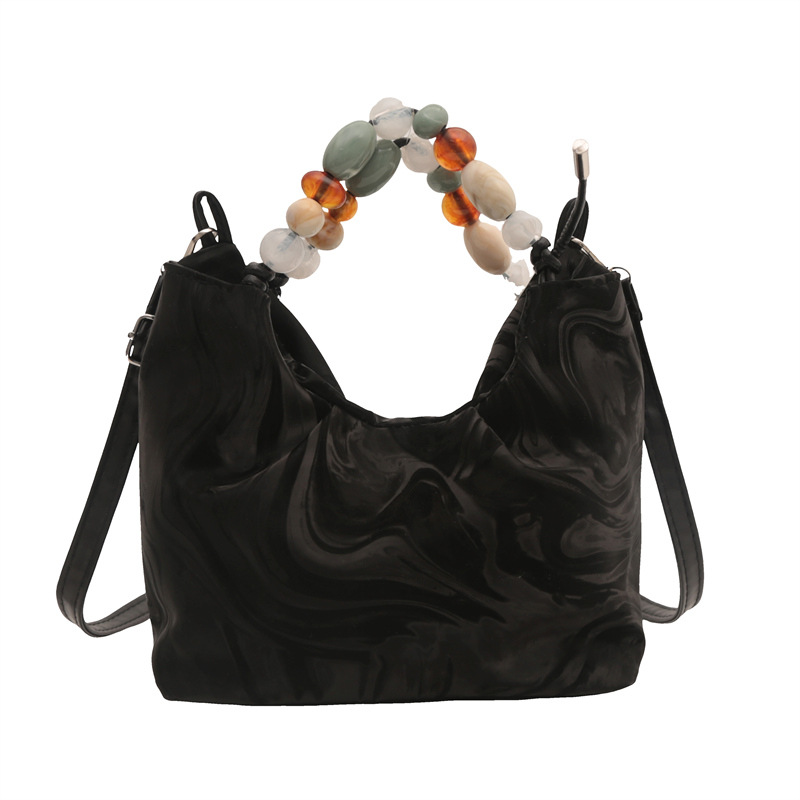 Nueva bolsa de estilo chino para mujeres 2024, nuevo verano, bolso de mochila de estilo exterior, bolso de cubo portátil super caliente.