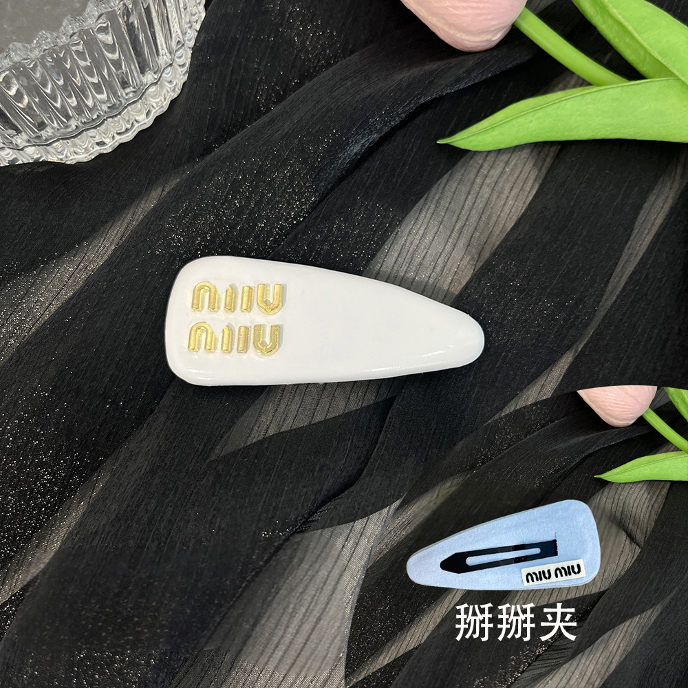 T25 # Original white bb clip (with back label)