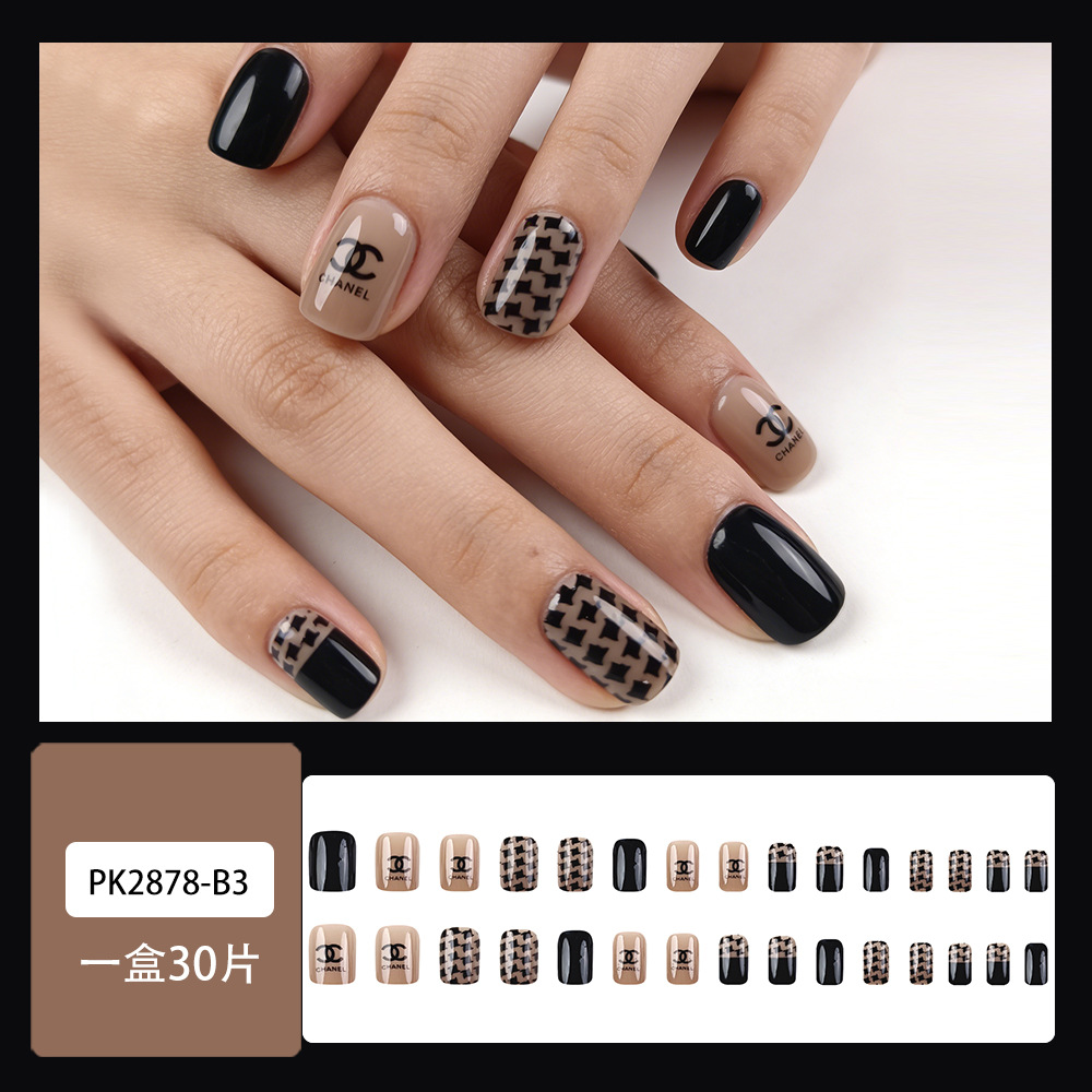 Explosión negra marrón mil pájaros manicure 24 piezas lujosas de alto nivel de manicure falsa de viento corta redonda productos terminados para usar uñas