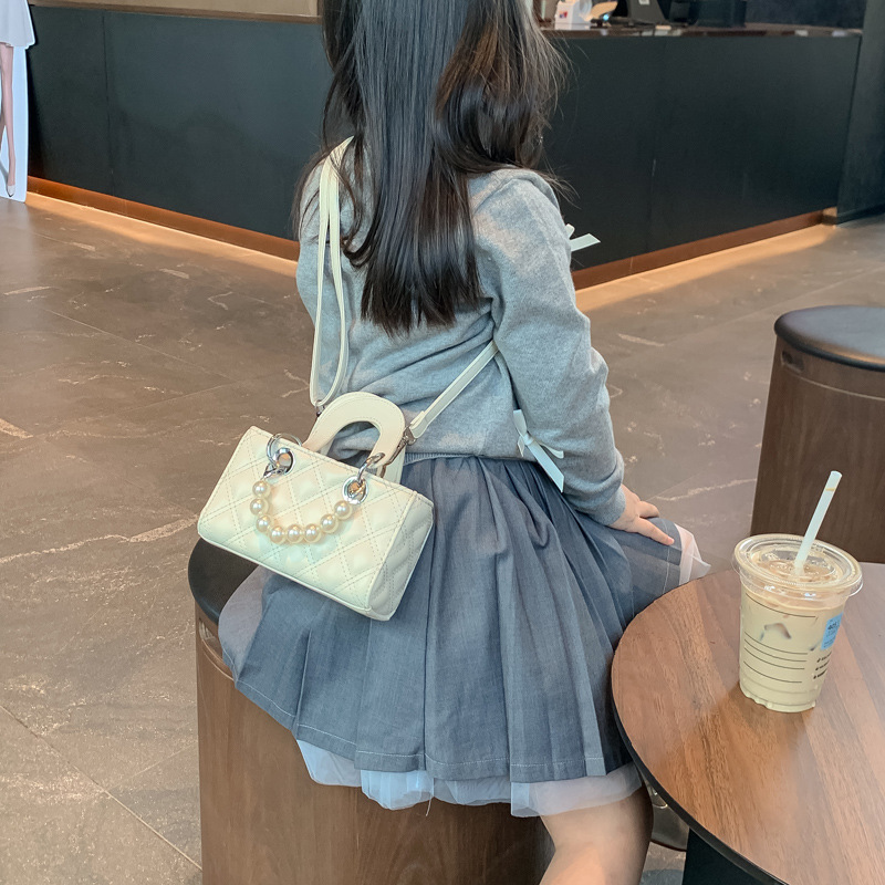 Bolsos de hombro coreanos para niños y niñas, bolsos de diamante de color sólido para niños, 2024 nuevos bolsos de perlas para niños