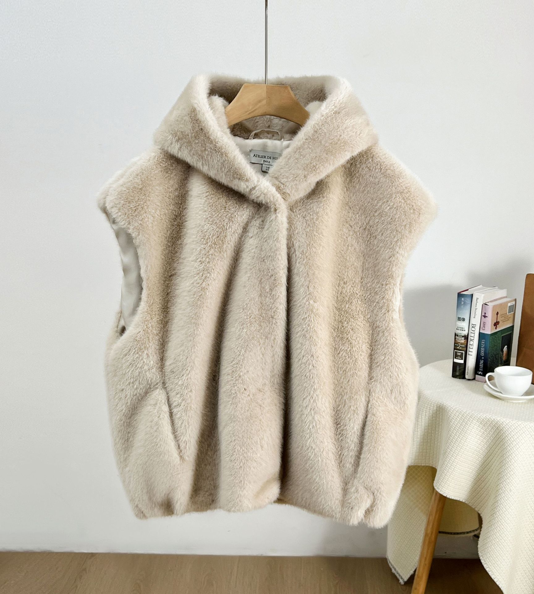 Primavera nuevo chaleco con capuzas de imitación de chaleco de botón una chaqueta de moda al por mayor corta
