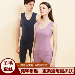 秋冬のカシミヤのシルクの保温ベストの新型の女性の身を修める丸首の底のシャツの上着の男性の袖なしのベスト