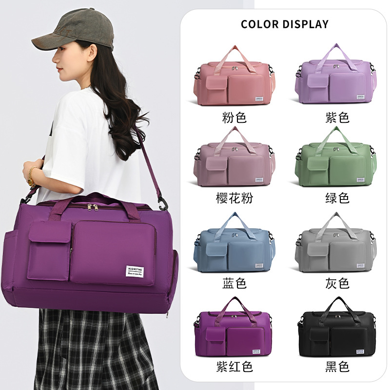 Large-capacity sports gym bag with a separate shoe compartment, a versatile and water-resistant travel bag that can be carried by hand or worn as a shoulder bag