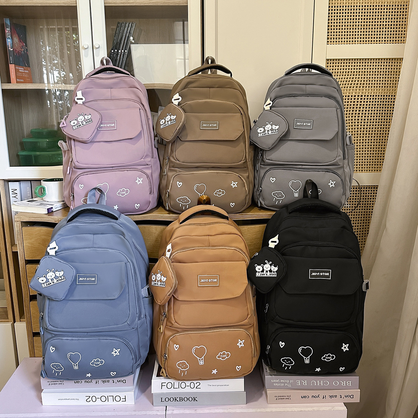 Mochila transfronteriza para estudiantes de secundaria JIAYISTAR Jiayi 2025 nueva bolsa de viaje mochila casual caliente