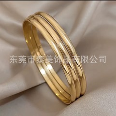 ヨーロッパとアメリカのファッショナブルな外径 65 ミリメートルブレスレットゴールドマルチ仕様チタン鋼ボールエッジ多層滑らかな球面リングブレスレット