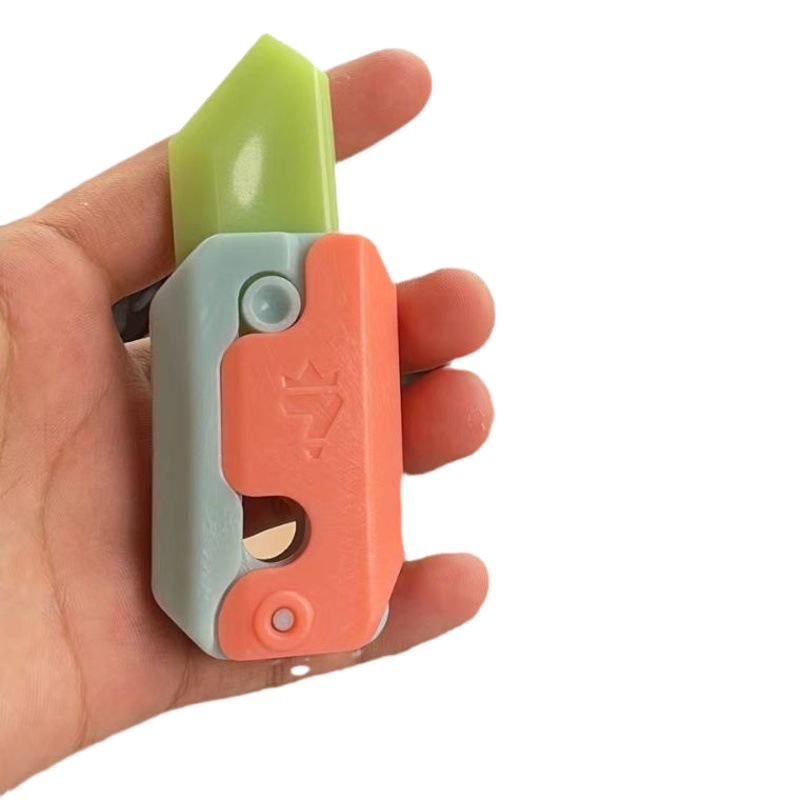 Cuchillo de rábano luminoso cuchillo de zanahoria luminoso Internet celebridad fluorescente plegable mini impresión 3D gravedad directa saltar cuchillo juguete