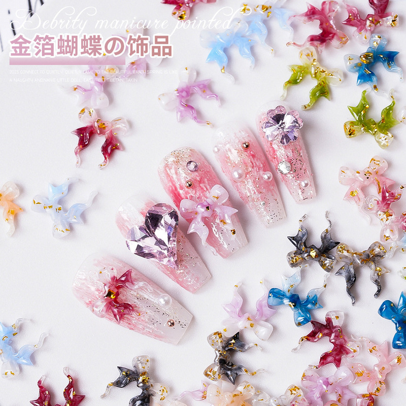New butterfly nail jewelry wholesale resin gradient nail accessories fairy three-dimensional gold foil bow nail drill New butterfly nail jewelry wholesale resin gradient nail accessories fairy three-dimensional gold foil bow nail drill