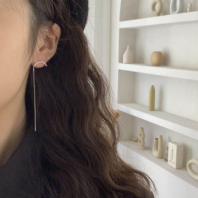 Pendientes de línea geométrica diseño estilo frío largo sonrisa borla pendientes Corea del Sur elegante Internet celebridad pendientes asimétricos