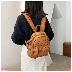 Mc高級軽贅沢旅行バッグ老花超ミニ両肩リュックサックファッションリベット女性バッグ工場