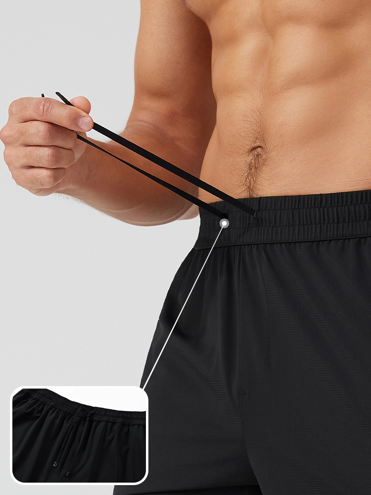 Pantalones cortos deportivos transfronterizos pantalones cortos masculinos de algodón y Nylon para correr en verano pantalones de cuatro puntos de fitness al aire libre pantalones cortos de maratón pantalones cortos especiales