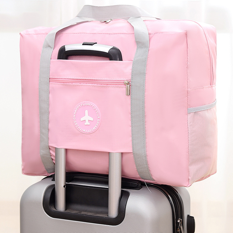 厂家直销日式旅行纯色小清新圆标拉杆包折叠旅行收纳袋衣物整理包