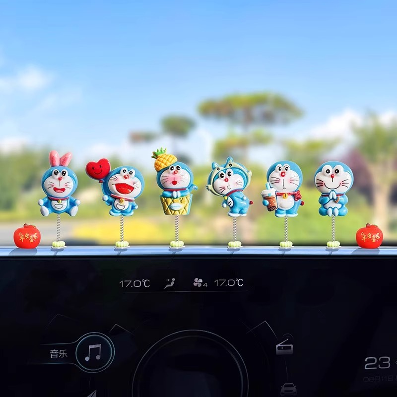 Nuevo lindo Doraemon decoración de coche creativo consola central de coche decoración de espejo retrovisor eléctrico interior