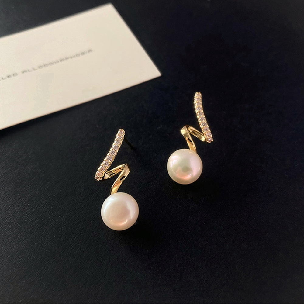 Aguja de plata de moda alta sensación de diamante de goteo de aceite pendientes nicho universal elegante pernos de orejas ligero lujoso temperamento simple orejas para mujeres